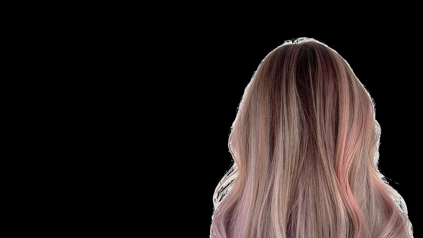 Tyce's work — a rose and lilac balayage, seen from behind